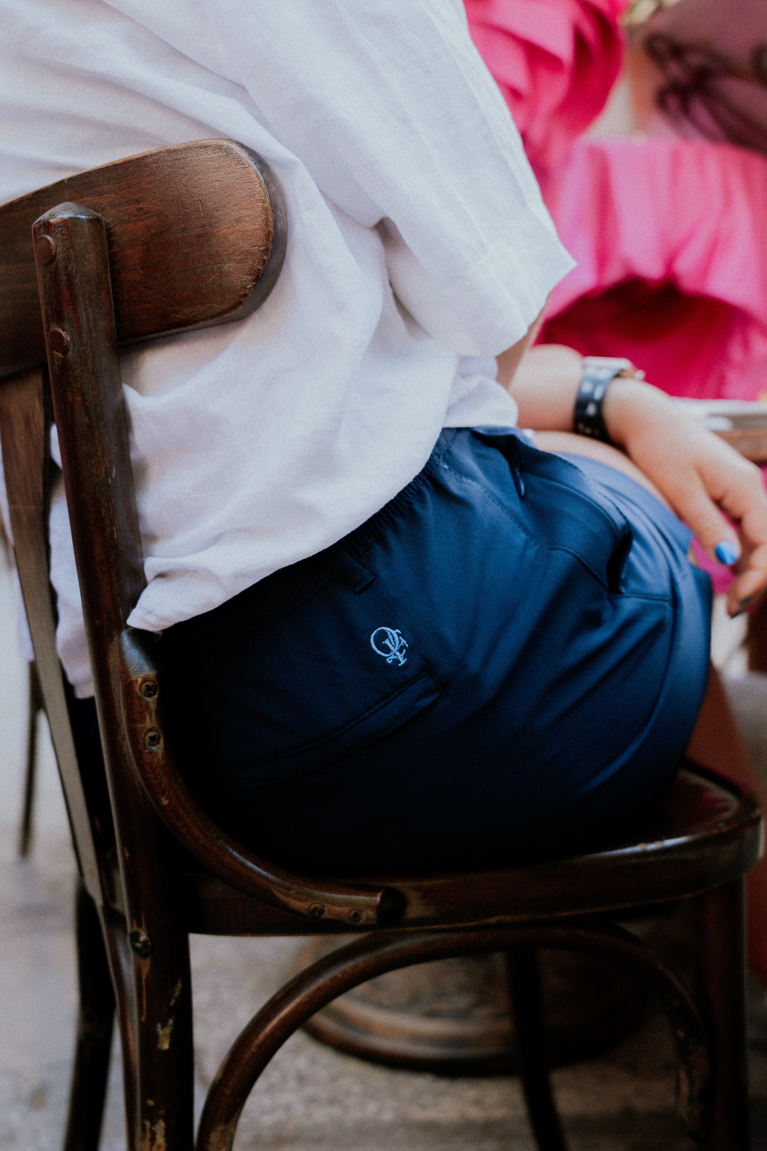Women wearing navy chino deck shorts. Women's deck shorts. Yachtwear, workwear