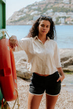 Woman wearing board shorts / running shorts. Yachtwear. Women's deck shorts.