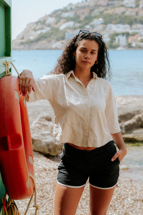 Woman wearing board shorts / running shorts. Yachtwear. Women's deck shorts.