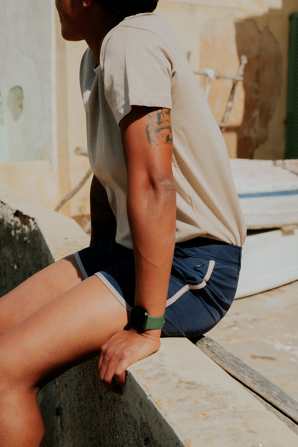 Woman wearing board shorts / running shorts. Yachtwear. Women's deck shorts.