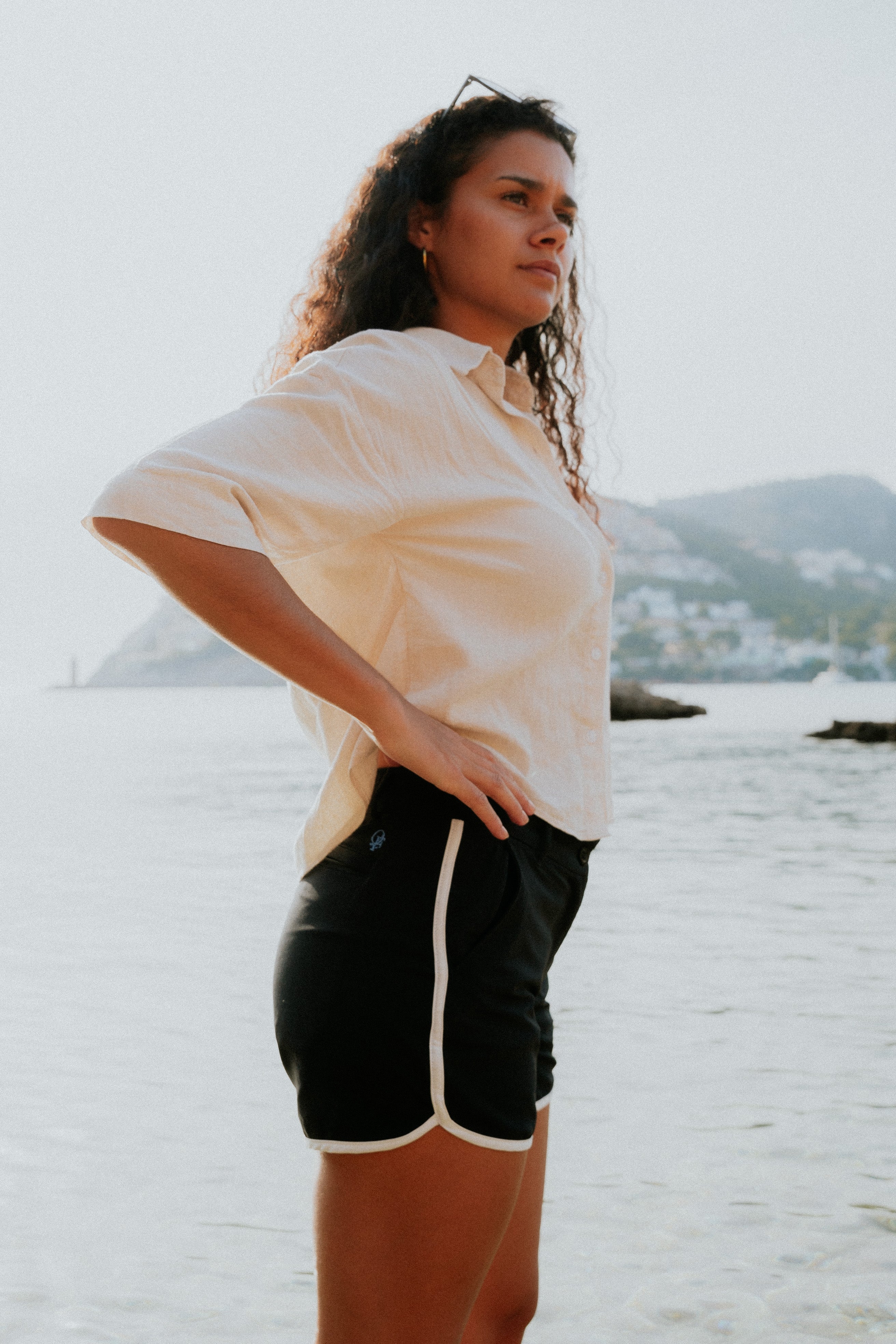 Woman wearing board shorts / running shorts. Yachtwear. Women's deck shorts.