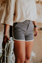 Woman wearing board shorts / running shorts. Yachtwear. Women's deck shorts.