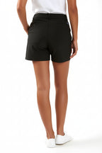 Women wearing black chino deck shorts. Yachtwear. Workwear. Sailing shorts