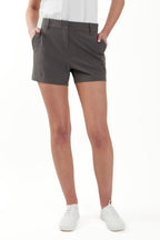 Women wearing grey chino deck shorts. Women's deck shorts. Yachtwear, workwear