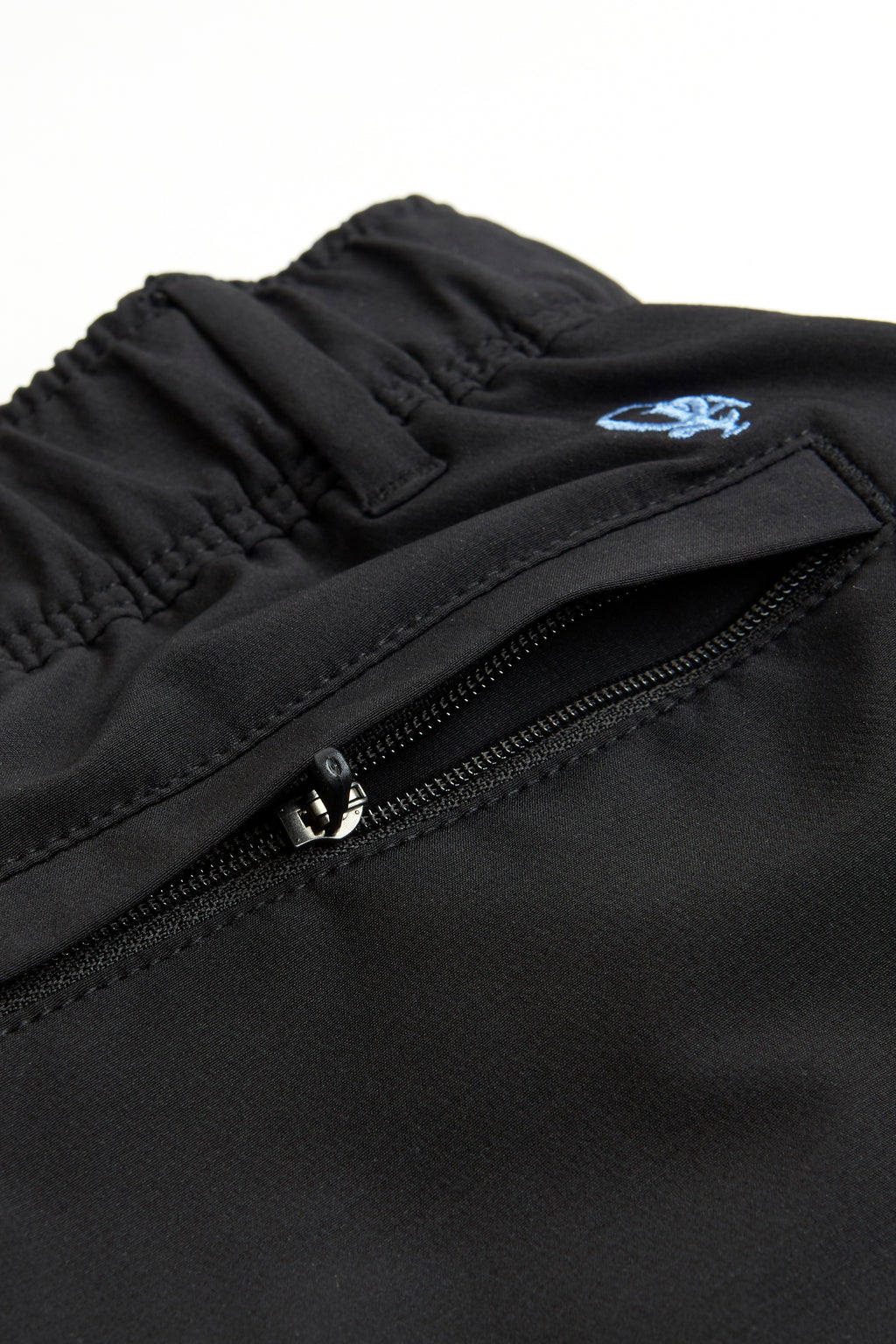 black chino shorts on a white background. Women's deck shorts. Yachtwear, workwear