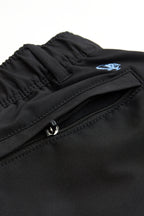 black chino shorts on a white background. Women's deck shorts. Yachtwear, workwear