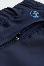 navy chino shorts on a white background. Women's deck shorts. Yachtwear, workwear