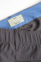 Gray shorts with a blue lining and a label inside. grey chino deck shorts. Women's deck shorts. Yachtwear, workwear