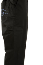 Woman in black boiler suit / coveralls. Workwear, streetwear. Workwear style