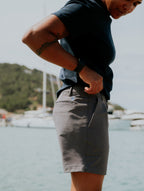 Person wearing a t-shirt and gray chino shorts. Yachtwear. Women's Deck Shorts.